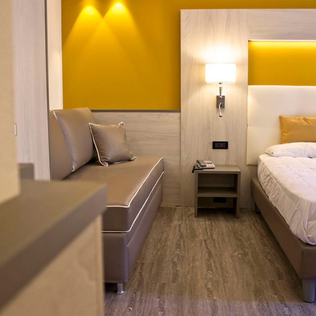 Arredo camere hotel con angolo cottura